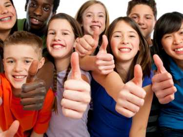 Group of diverse youth with thumbs up